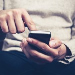 woman uses a smartphone